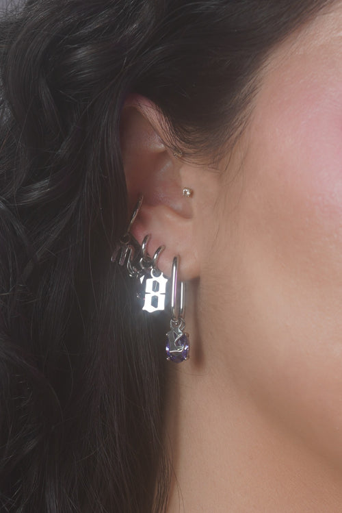 in the wild — letter + number stack, silver