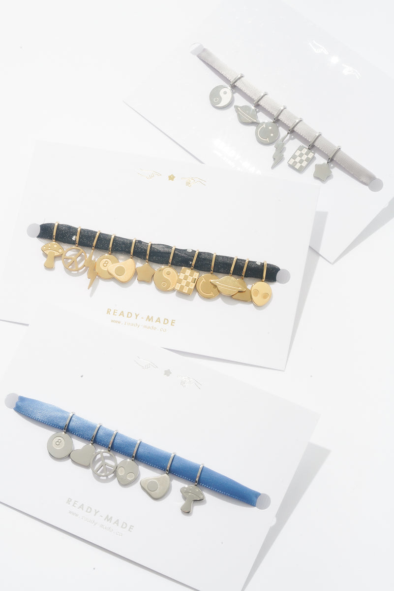 Ready-Made Get Charmed charms on ribbon
